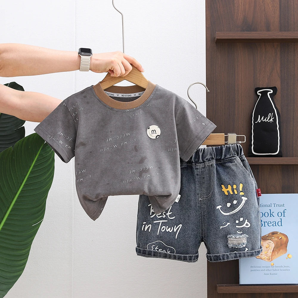 2026 LY New Summer Korean Style Cartoon Woven Loose Casual Short Sleeve 100% Cotton T-Shirt Gold-embossed Logo Young Children