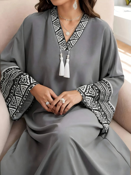 Ladies' casual and elegant Middle Eastern Muslim robe, solid color tassel detail dress, long skirt